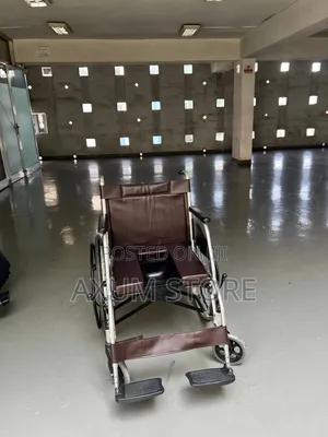 Brown Manual Wheelchair — ቡኒ ማንዋል ዊልቸር