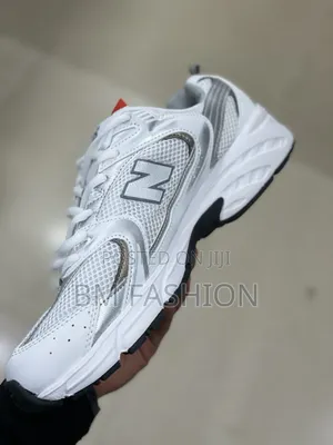 White and Silver New Balance 530 Sneaker With a Breathable Mesh Upper
