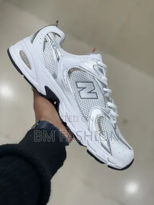 White and Silver New Balance 530 Sneaker With a Breathable Mesh Upper