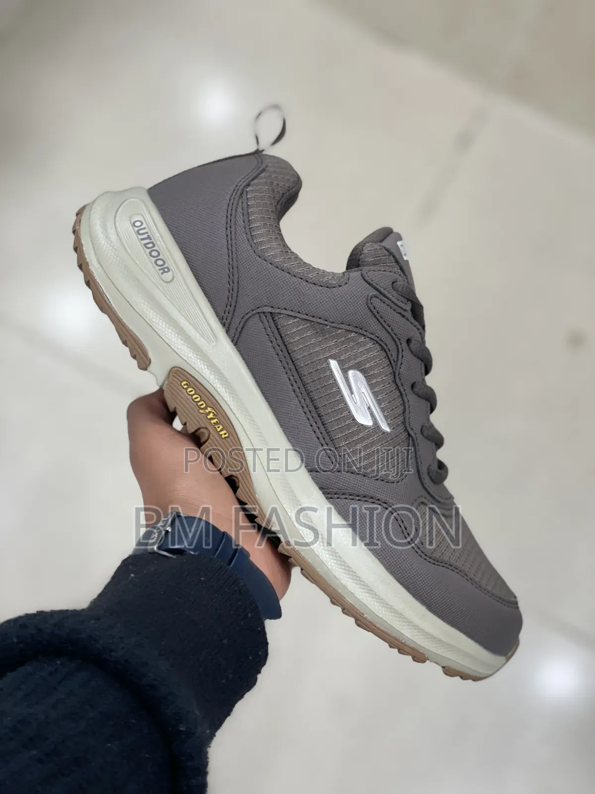 Grey Skechers Outdoor Goodyear Sneaker With a Beige and Brown Sole