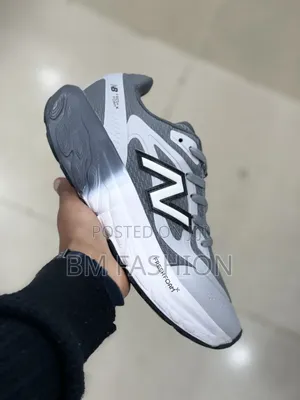 Gray and White New Balance Fresh Foam Trainer Sneakers
