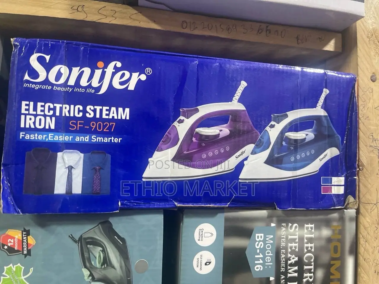 Sonifer Electric Steam Iron (Sonifer ኤሌክትሪክ የእንፋሎት ልብስ መተኮሻ)