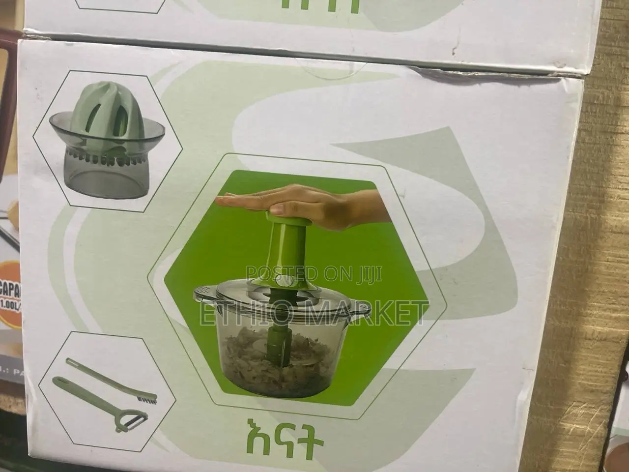 A Manual Hand-Press Vegetable Chopper and Food Processor