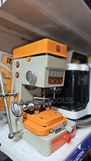 Key Cutter ቁልፍ ሠሪ