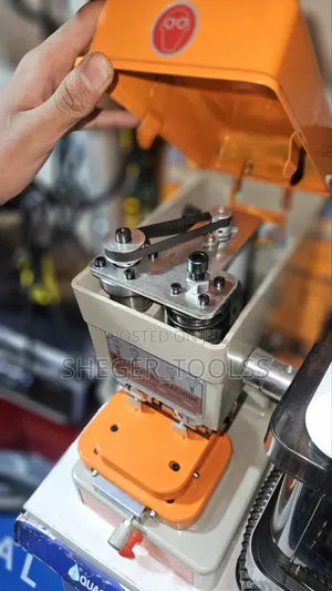 Key Cutter ቁልፍ ሠሪ