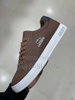 Lacoste Brown Textured Leather Casual Sneaker With a White Rubber Sole