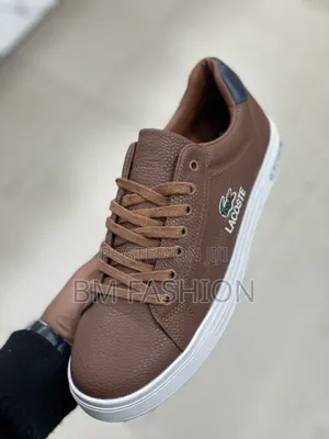 Lacoste Brown Textured Leather Casual Sneaker With a White Rubber Sole