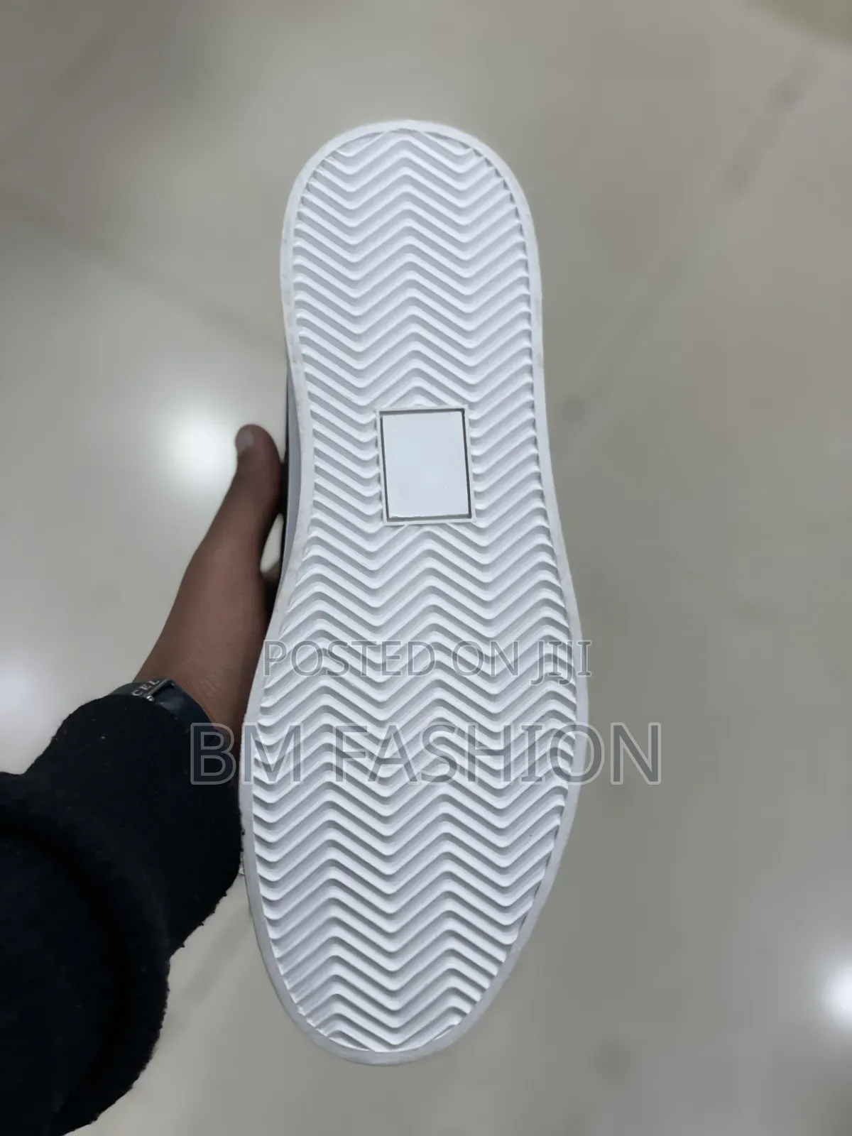 Boss Sleek Black Slip-on Sneaker Showcases a Textured Leather Upper