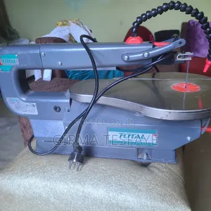ቅርፃቅርፅ መስሪያ Scroll Saw