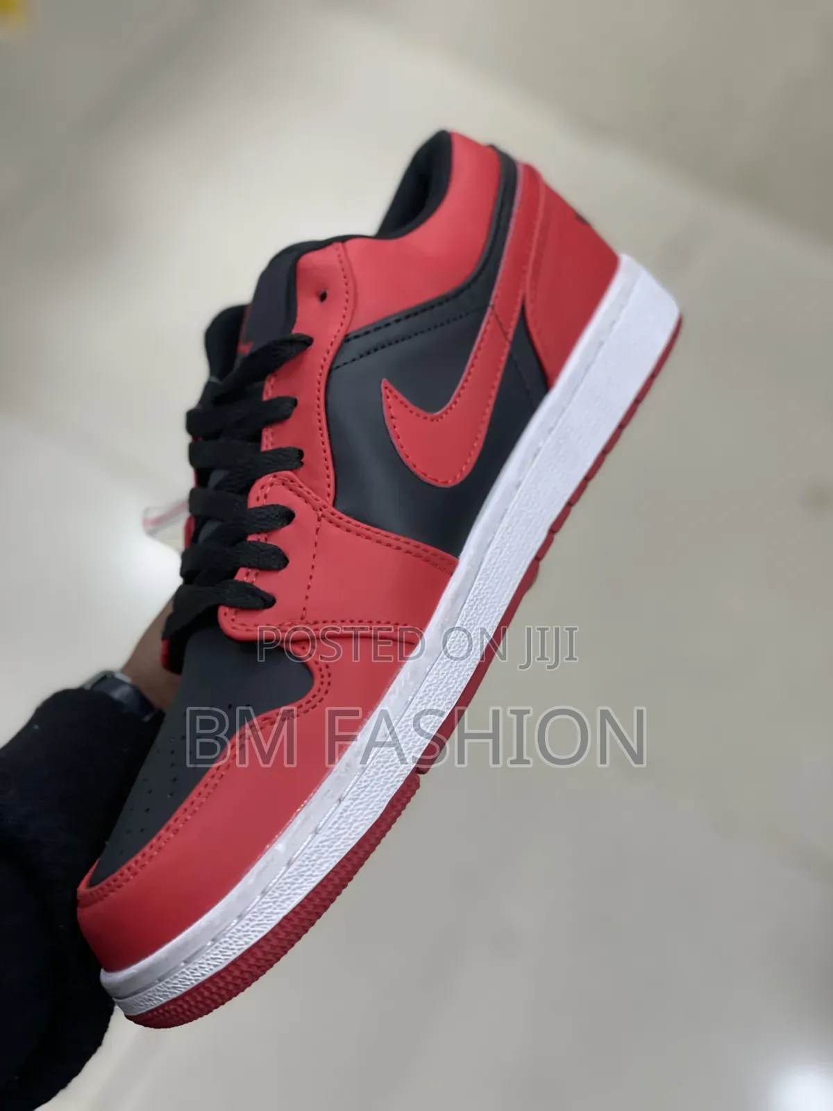 Air Jordan 1 Low "Reverse Bred" Feturing Strking Red and Black Leather