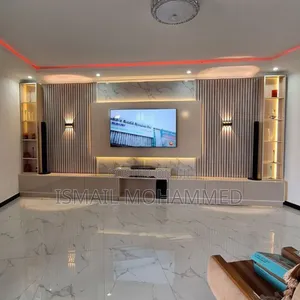 በካሬ ሜትር (በልክ) ለሚሰሩ የቲቪ ስታንዶች (Custom Wall Unit TV Stands)