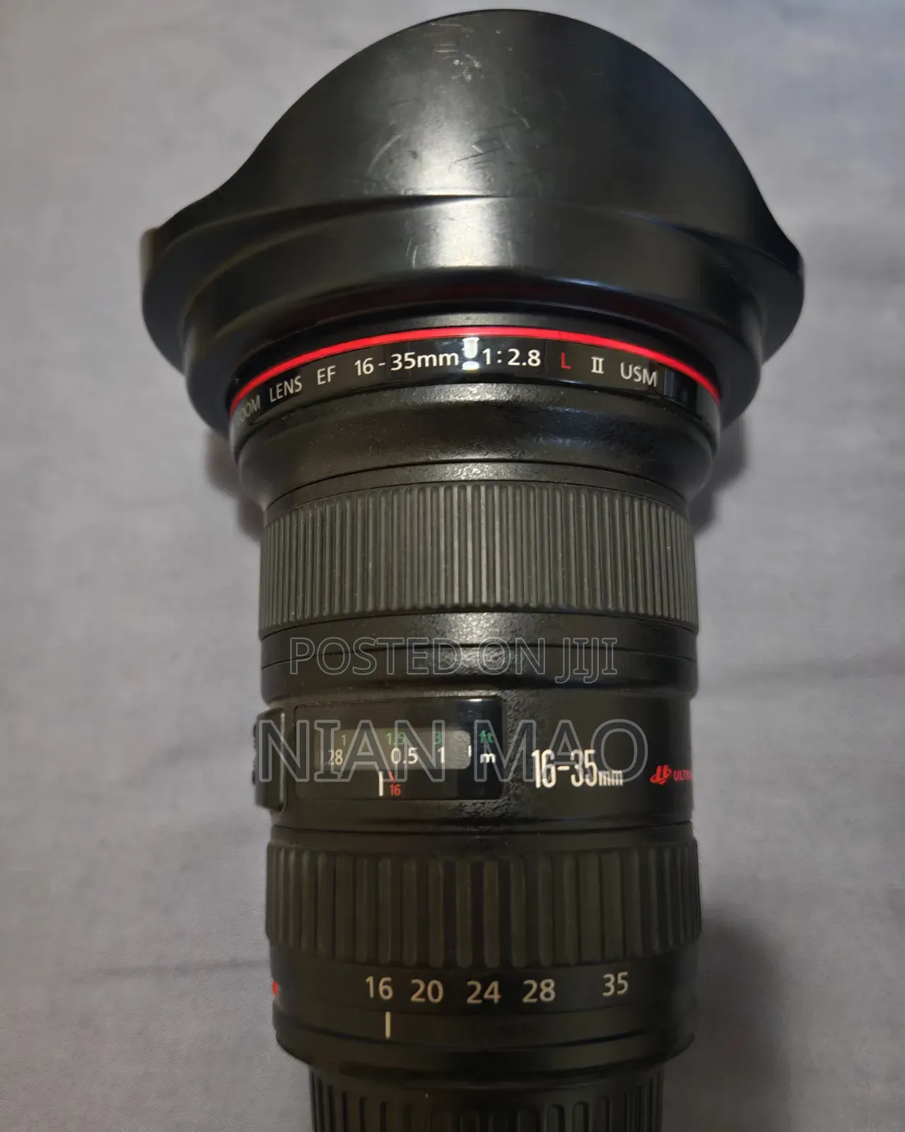 Camera Body, Three Lenses, Tripod, and Dry Cabinet.