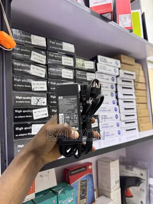 የ ኤችፒ ሴንተር ፒን ላፕቶፕ ቻርጀር (HP Center Pin Laptop Adapter