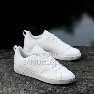 Adidas Color: White With a Black Heel