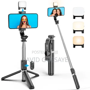 Pnitri Selfie Stick, Inbuilt Tripod and Light That Is Adjustable