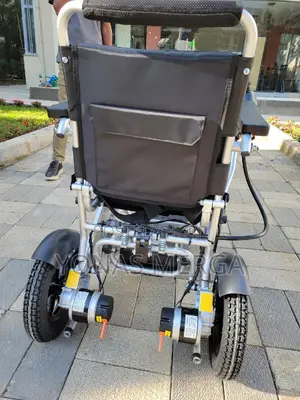 Electrical Wheelchair=joystick Controller, a Black Mesh Seat Cushion