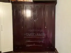 Spacious 4-Door Wooden Wardrobe