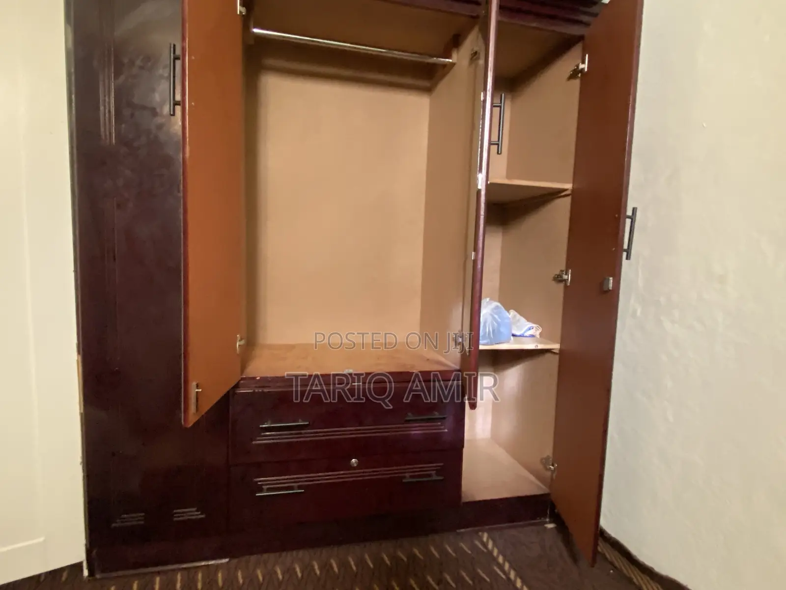 Spacious 4-Door Wooden Wardrobe