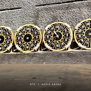 Ethiopian Cultural Wooden Wall Clock – Handcrafted Home Decor