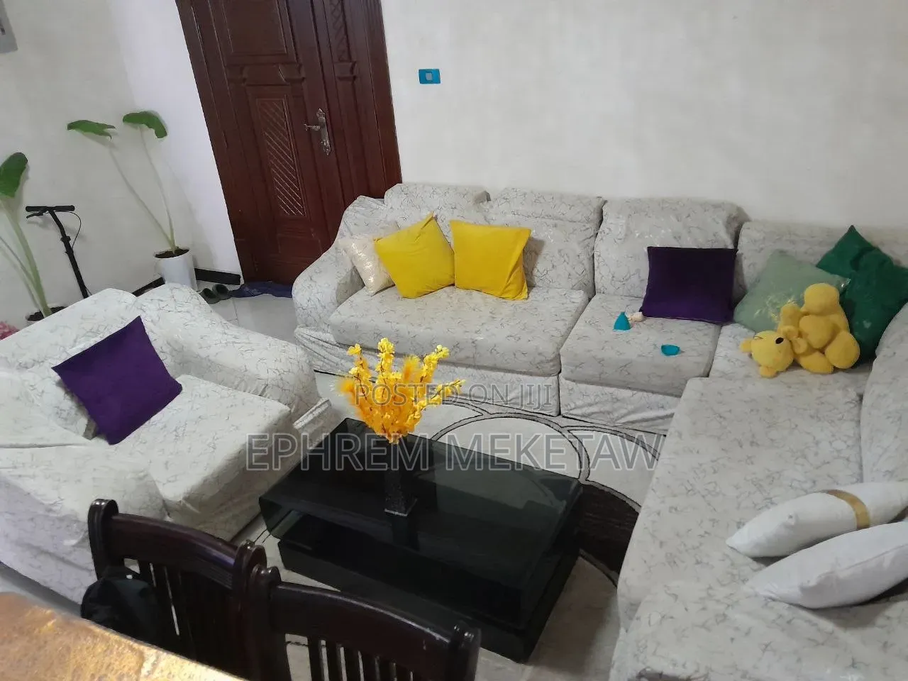 L-Shaped Sofa Set With Centered Table and Cushions and Center Table
