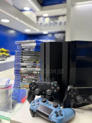 PlayStation 4 Fat + With 2 Controller + Jailbreak ነው