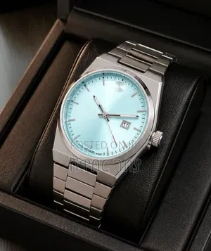 Movado Men's Premium Watch Silver Steel Band With Light Blue Dial