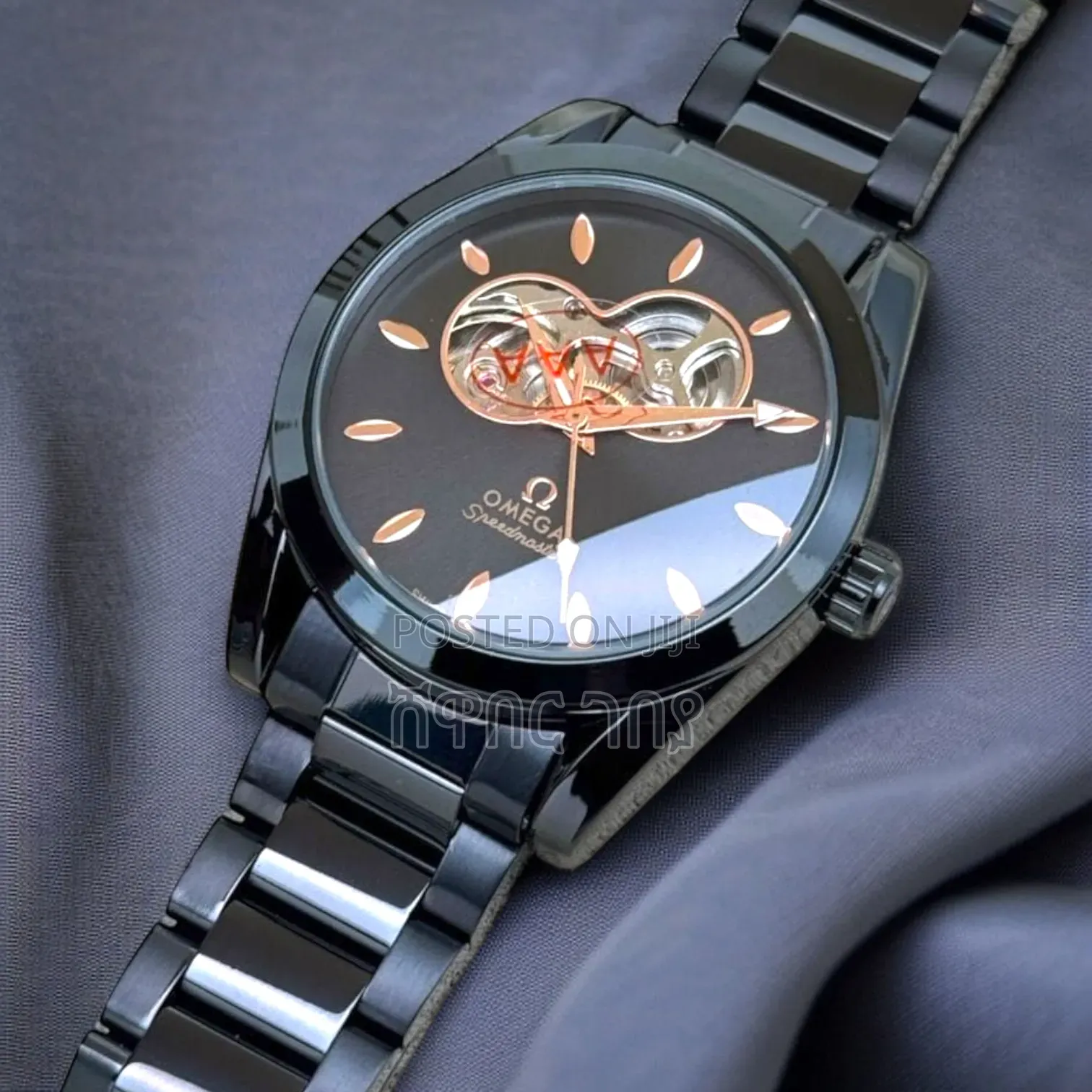 Omega Speedmaster Men's Black Watch Featuring Open Heart Dial
