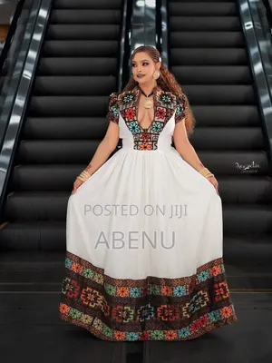 Elegant White Habesha Kemis With Colorful Embroidery