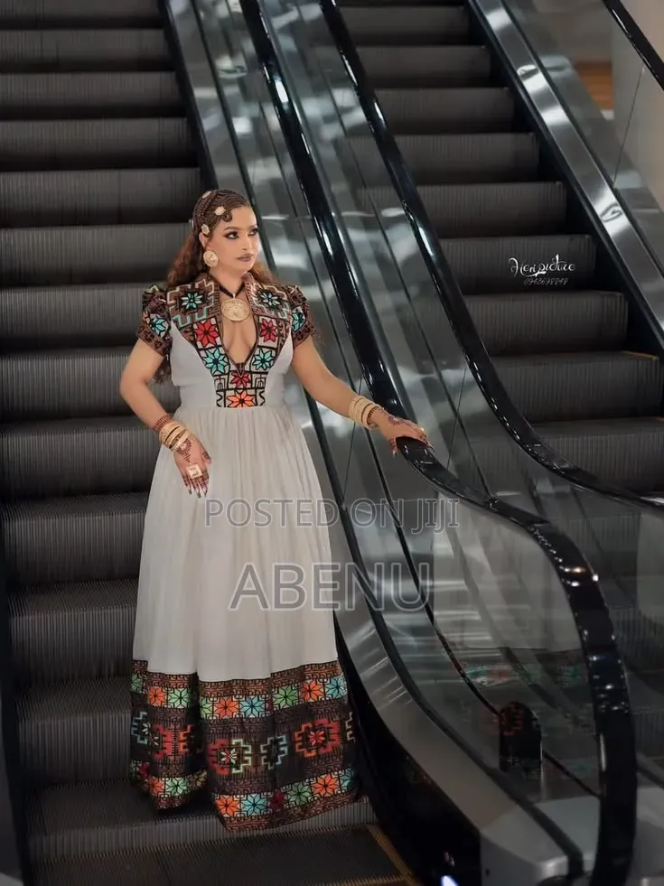 Elegant White Habesha Kemis With Colorful Embroidery