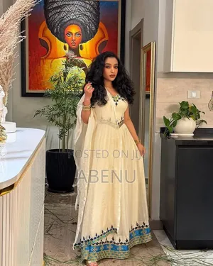 Elegant White Habesha Kemis With Colorful Embroidery