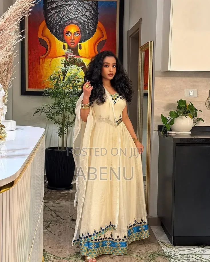 Elegant White Habesha Kemis With Colorful Embroidery