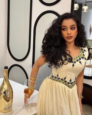 Elegant White Habesha Kemis With Colorful Embroidery