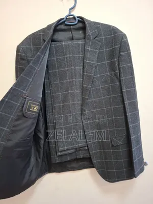 Suit የወንድ መሉ ልብስ ሱፍ