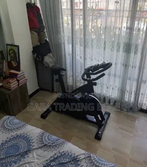 ዘመናዊ Exercise Bike ለካርዲዮ ስፖርትና ለጤና የቤት ውስጥ የእግር ስፖርት መሣሪያ