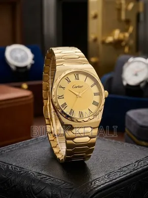 Cartier-Style Analog Wristwatch Features a Yellow-Gold Finish, a Gold