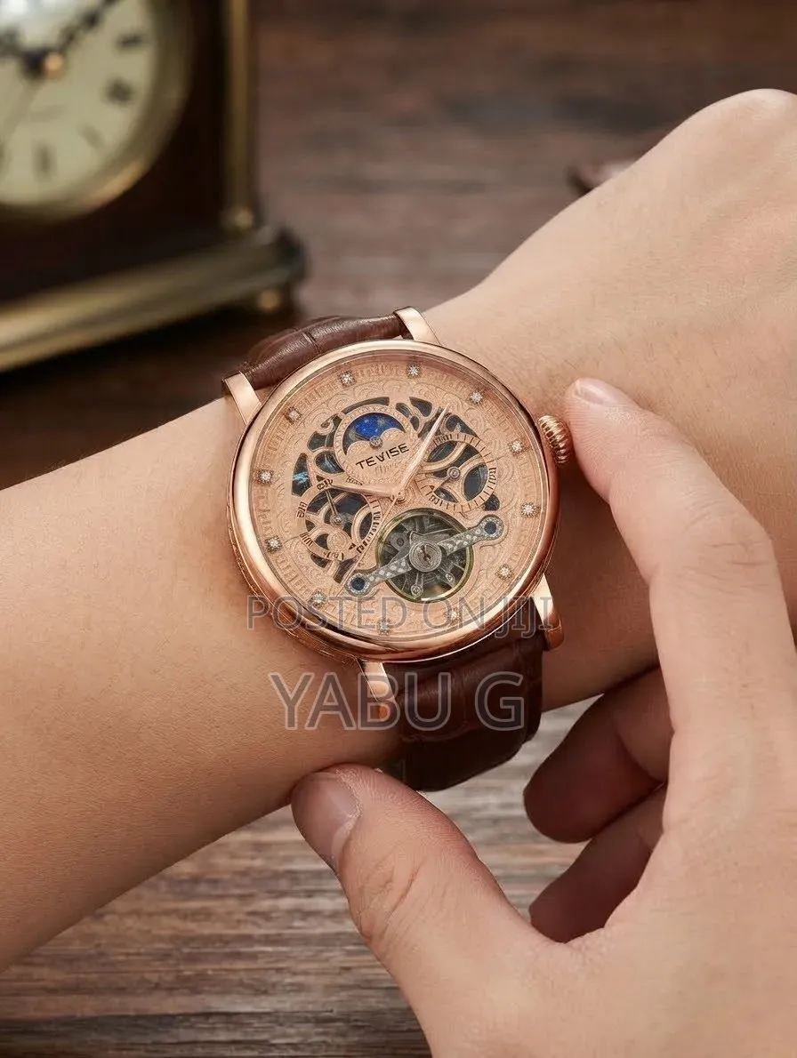 Tevise Rose Gold-Tone Carved Case,a Moon-Phase Day-and-Night Indicator