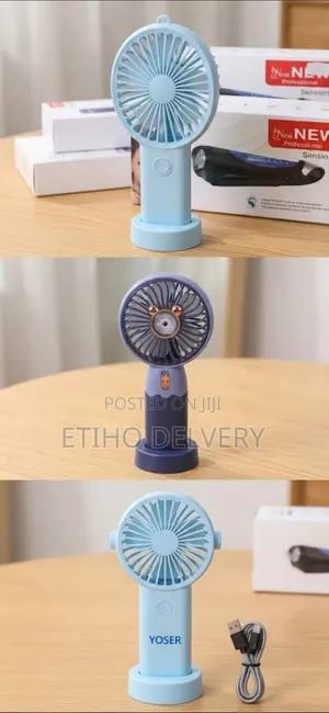 A Portable, Rechargeable Mini Handheld Fan With a Detachable Base And