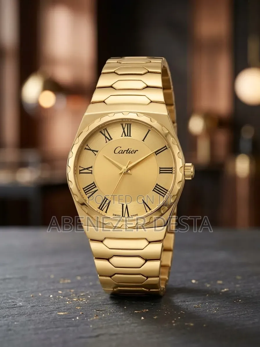 Gold-Colored Analog Wristwatch Branded With the Cartier Logo