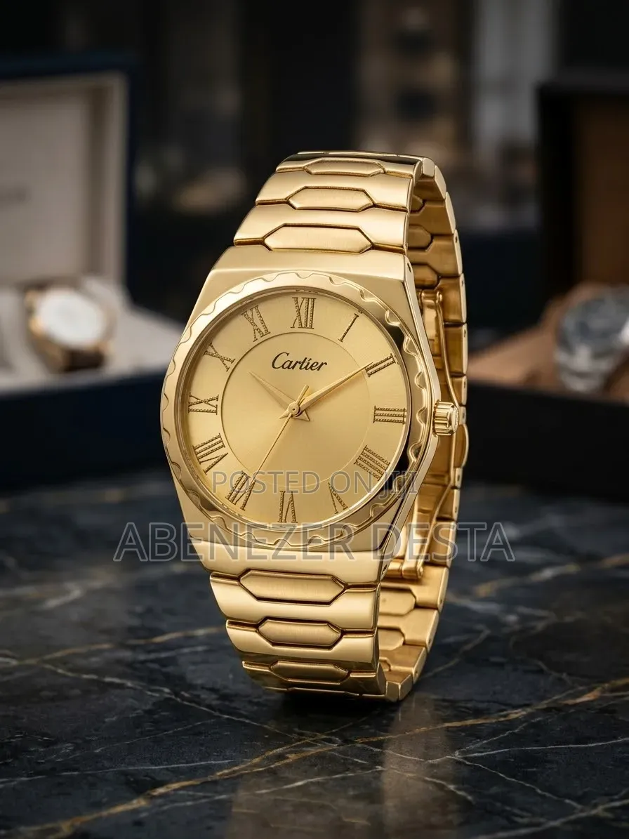 Gold-Colored Analog Wristwatch Branded With the Cartier Logo