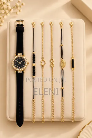 A Luxury Gold and Black Watch & Bracelet Set
