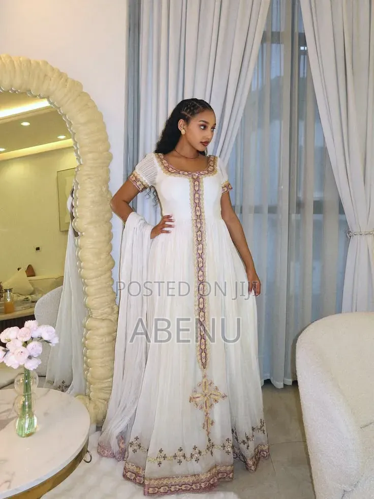 Elegant White Habesha Kemis With Gold and Purple Embroidery