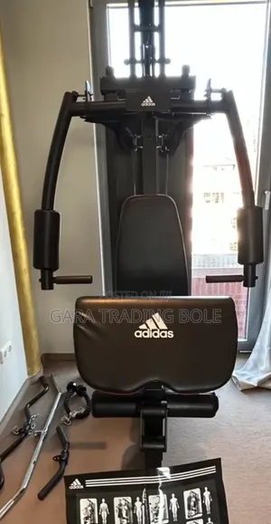 የጀርባ ጡንቻ ልምምድ (Lat Pulldown): የጀርባና የትከሻ ጡንቻዎችን ለማጠናከር።