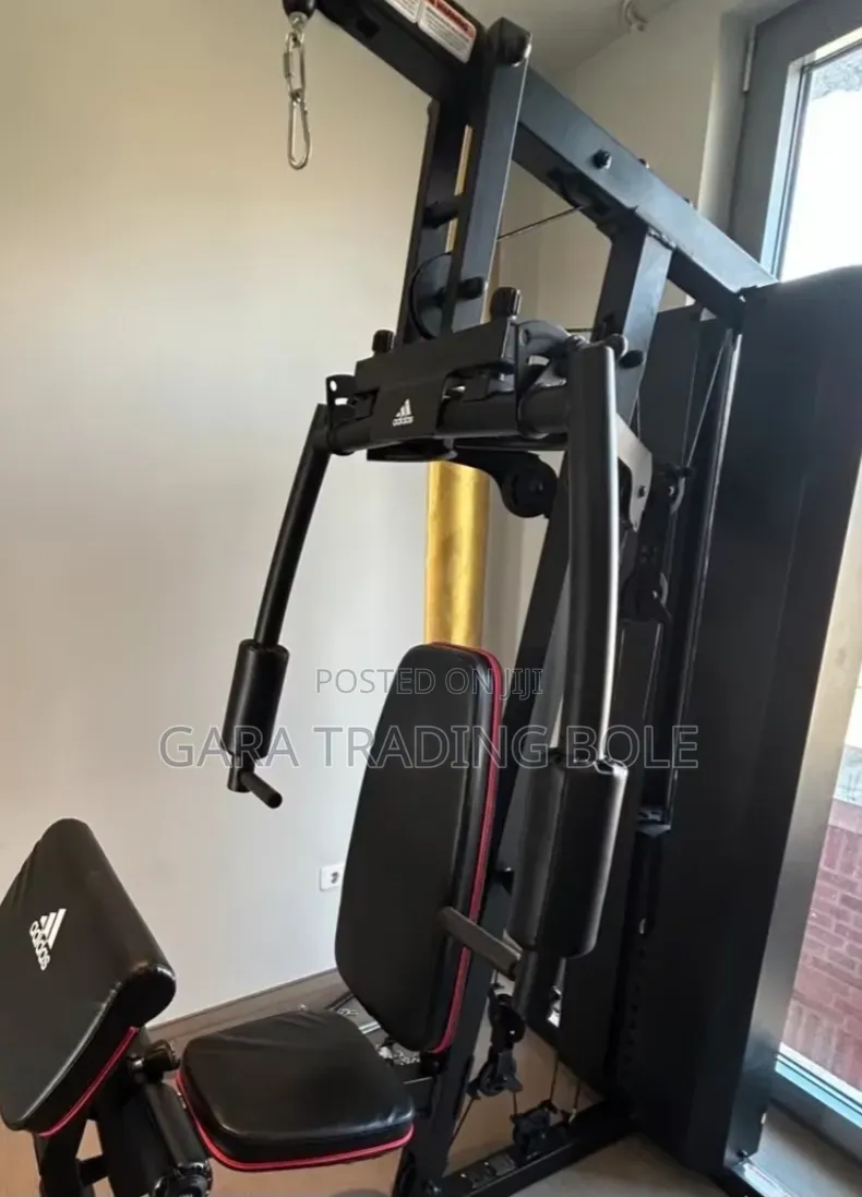 የጀርባ ጡንቻ ልምምድ (Lat Pulldown): የጀርባና የትከሻ ጡንቻዎችን ለማጠናከር።