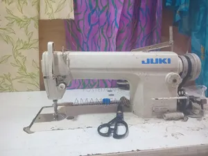 Singer የስፌት መኪና Juki