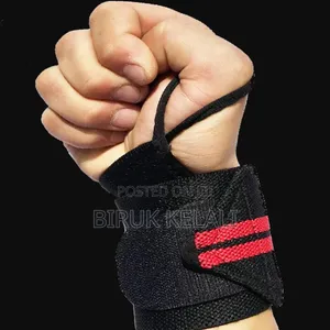 Adjustable Black and Blue Weightlifting Wrist Wrap With a Thumb