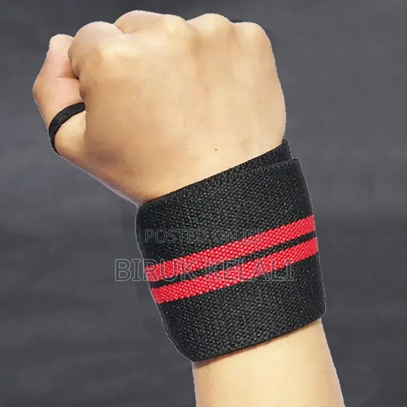 Adjustable Black and Blue Weightlifting Wrist Wrap With a Thumb