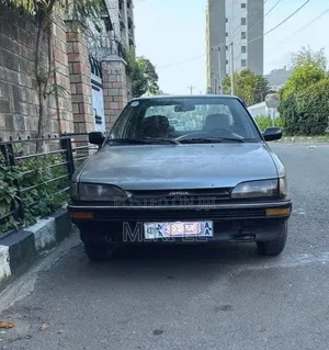 Toyota Corolla II 1.3 FWD 1991 Gray