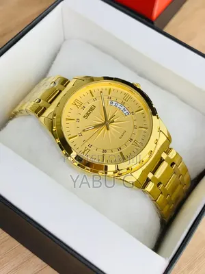 Skmei Watch Features a Prominent Gold-Toned Stainless Steel Band