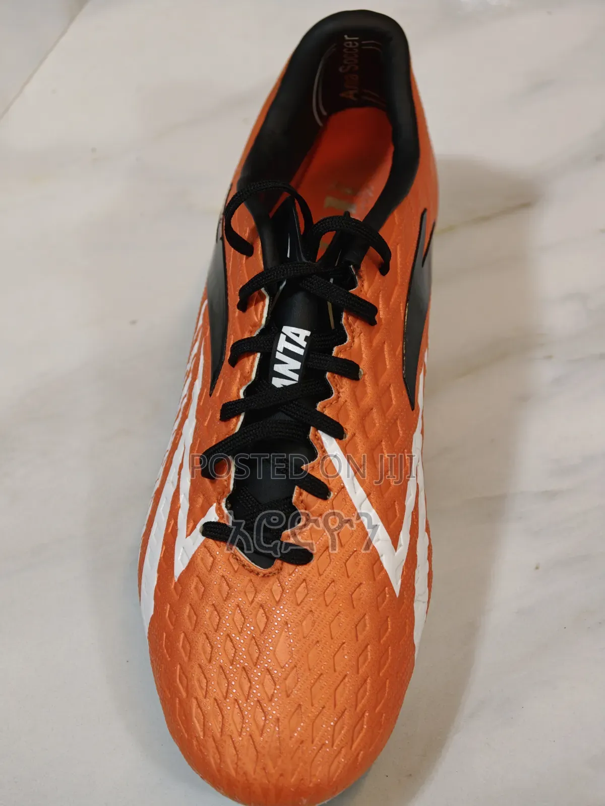 Football Shoes የእግር ኳስ ታኬታ