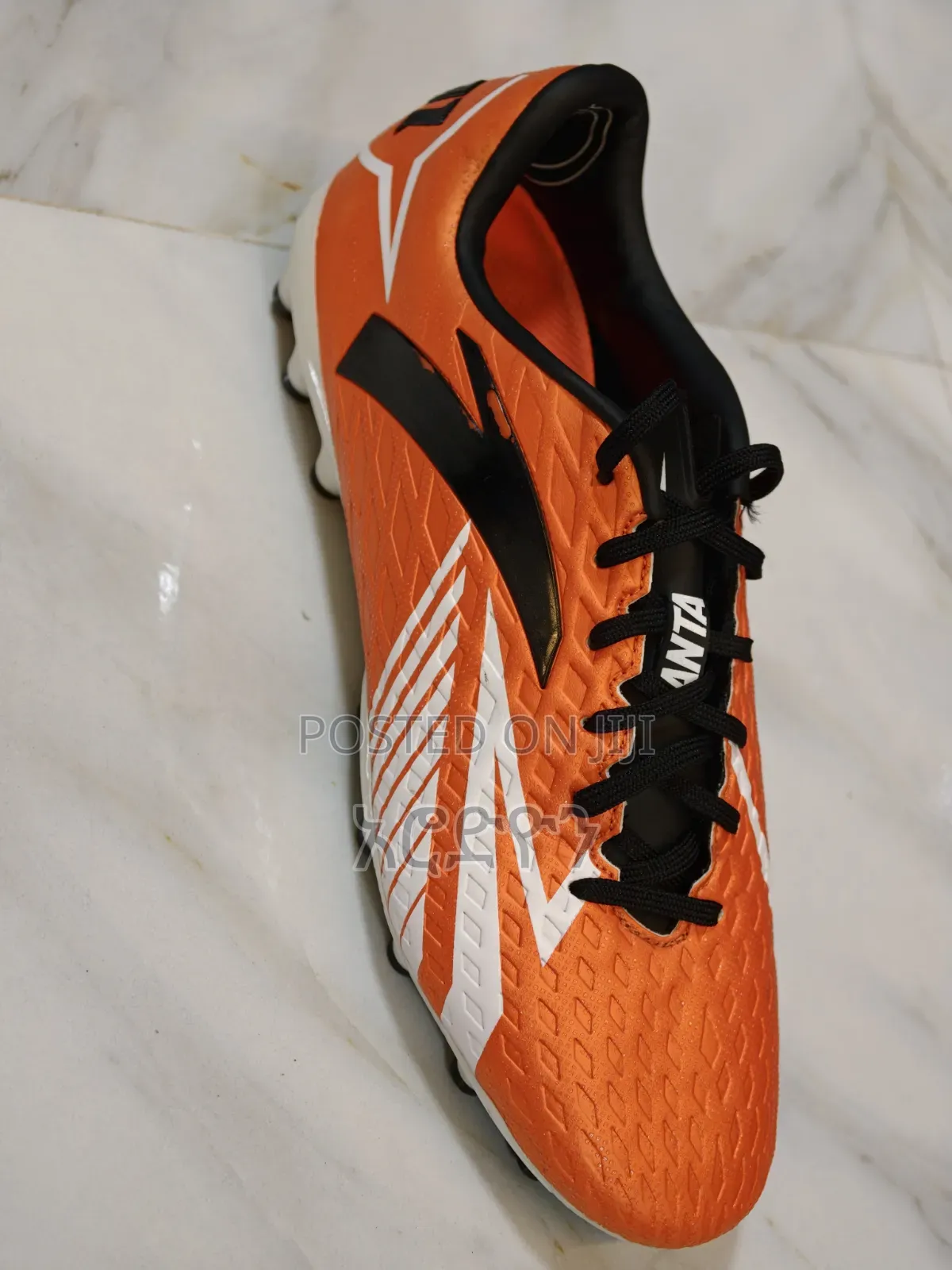 Football Shoes የእግር ኳስ ታኬታ